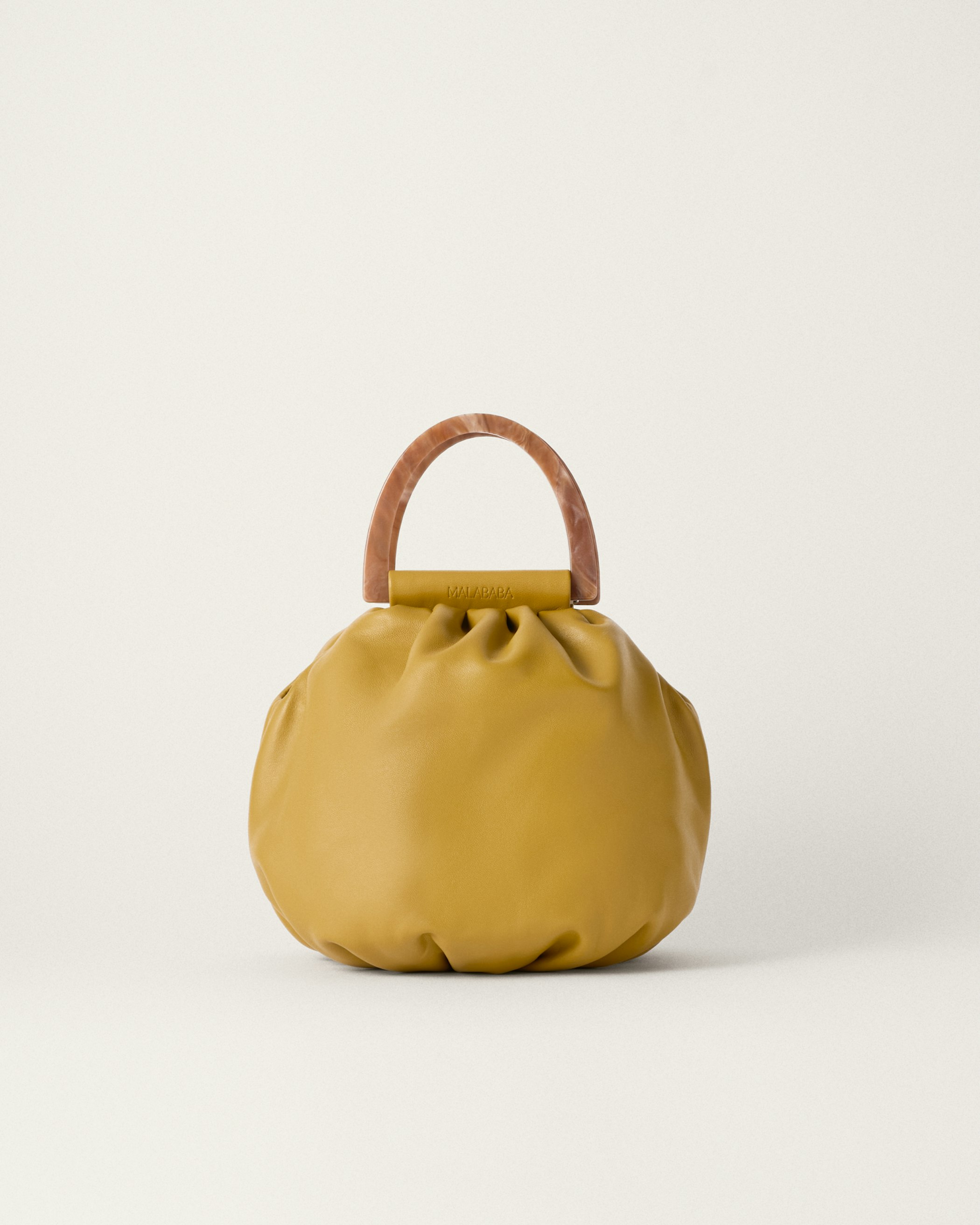 Bola Caramelo  first