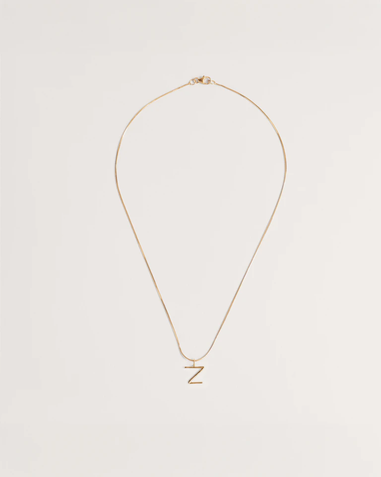 Colgante con letra oro Abecé